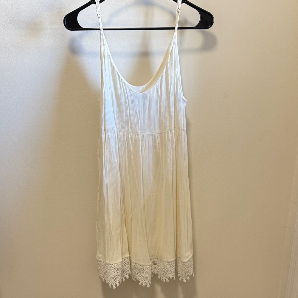 Elegant White Lace-Trimmed Beach Dress